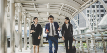 business-colleagues-walking-talking-and-travelin-2026-01-11-09-01-22-utc