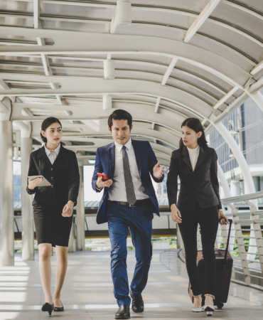 business-colleagues-walking-talking-and-travelin-2026-01-11-09-01-22-utc